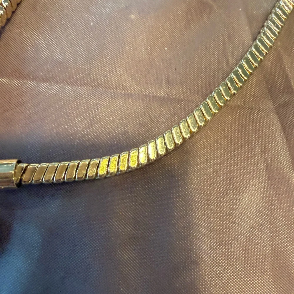 kate spade Gold Tone Phone Wrist Strap with Black Cord Loop